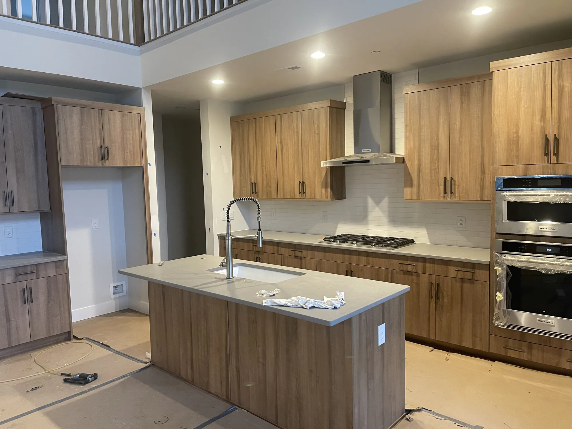Wood-Grain Kitchen With KitchenAid Ovens, Kitchen Remodel